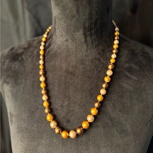Vintage shades of brown and copper bead necklace.